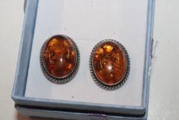 A pair of Sterling silver and amber ear-rings with