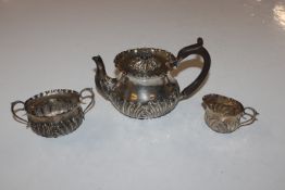A silver three piece tea set, approx. total weight