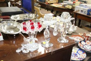 A pair of crystal candlesticks with floral form AF