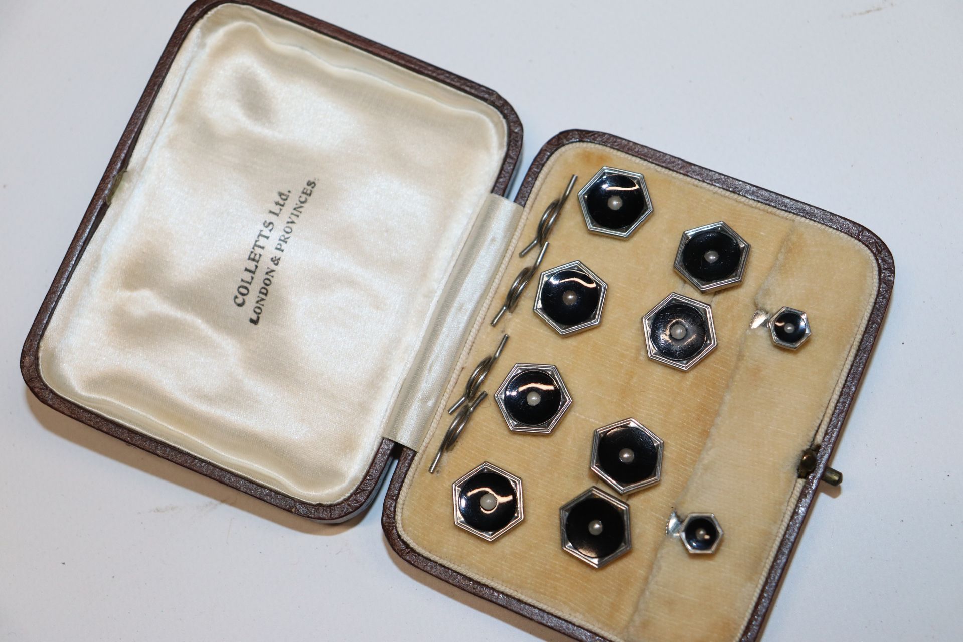 A box containing silver decanter label, cased cuff - Image 2 of 11