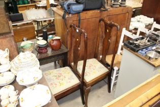 A pair of Queen Anne style dining chairs with need