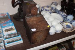 An antique elm candle box and contents of various