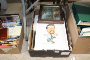 A box of various pictures and prints