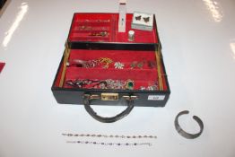 A cantilever jewellery box and contents of jewelle