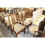 A set of six mahogany dining chairs, comprising of