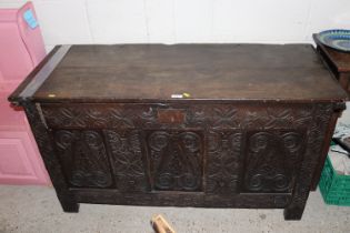 A 17th Century carved oak coffer