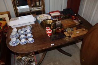 A 19th Century mahogany pedestal supper table