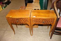A pair of walnut single drawer bedside chests