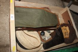 A box of various shooting related items