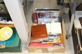 A box containing various artists materials to incl