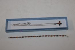 A Sterling silver and amber bracelet and similar b