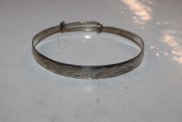 A Chinese silver bangle, approx. 10.5gms