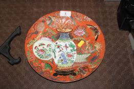 A Japanese floral bird and insect decorated plate