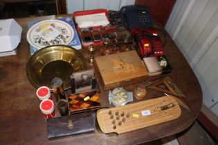 A set of brass and wooden postal scales and weight