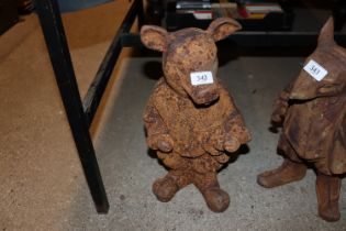 A rusty cast iron model of a pig