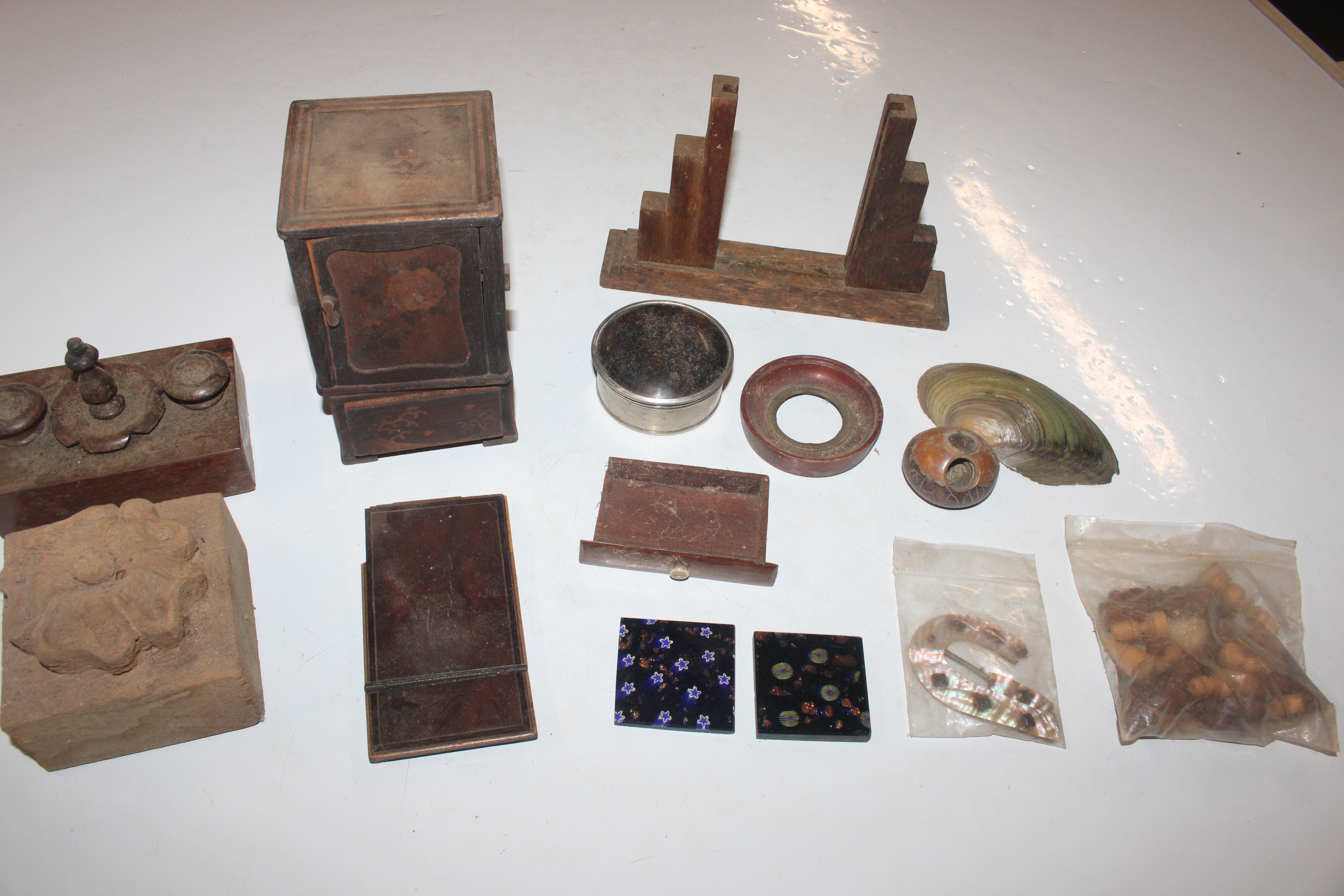 A box of various wooden items to include cigarette