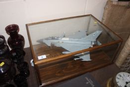 A display case containing a model aeroplane