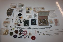 A box of jewellery beads, pendants and charms