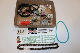 A box of various costume jewellery