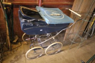 A Marmet pram with with a Morelands pram canopy, i