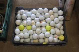 A quantity of various used golf balls to include T