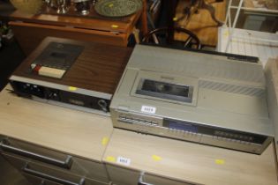 A Sanyo video cassette recorder and a Sanyo casset