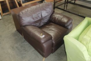 A deep seated leather armchair AF