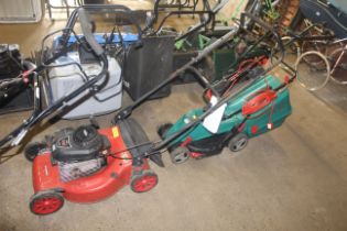 A Champion rotary lawn mower with Briggs & Stratto