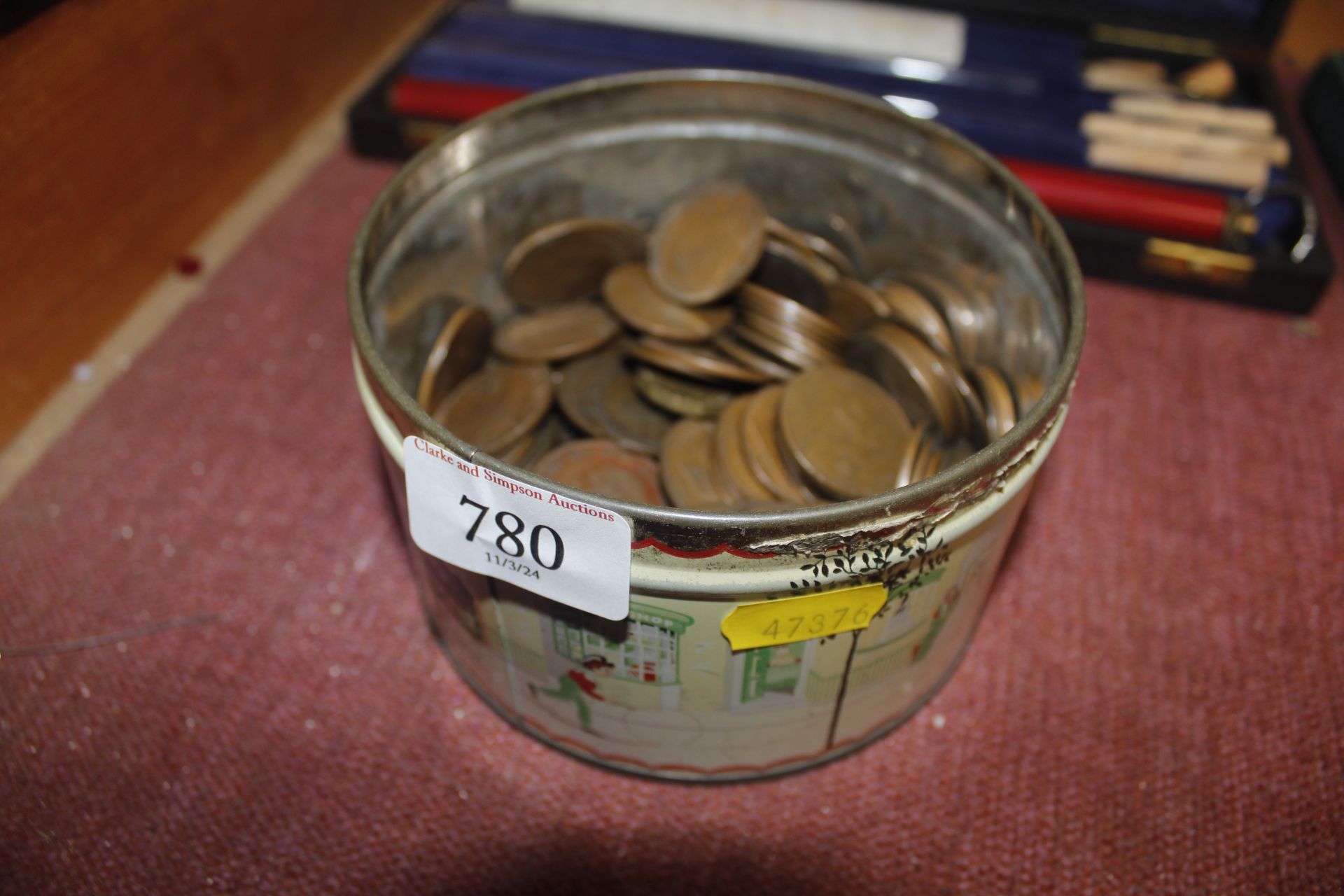A tin of miscellaneous copper coinage
