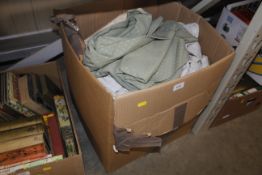A box of miscellaneous curtains and textiles