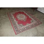 A floral patterned rug AF approx. 7'7" x 5'4"