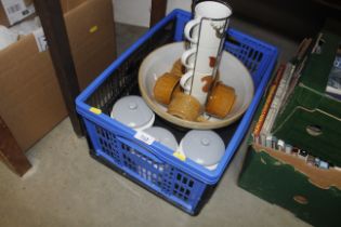 A large mixing bowl, three storage jars etc.