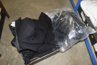 A black duffle coat, leather jacket and other items