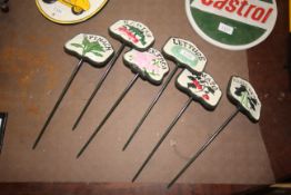 Six painted cast iron salad markers (199)