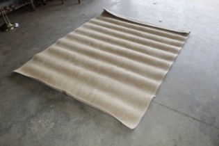 A hessian rug approx. 7'4" x 5'3"