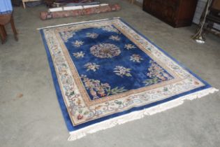 A Chinese rug approx. 9'8" x 6'2"