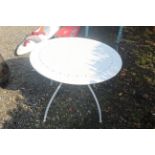 A pierced metal circular garden table, approx. 37"