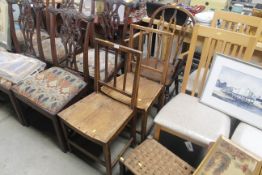 An antique elm seated Windsor type elbow chair and