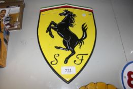 A reproduction cast iron Ferrari plaque