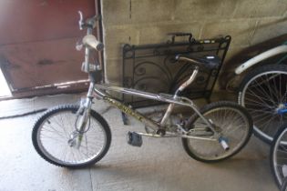 A child's Odyssey diamond back BMX bike