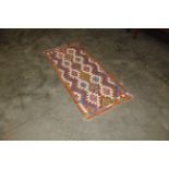 A Chobi Kilim runner approx. 5' x 2'2"