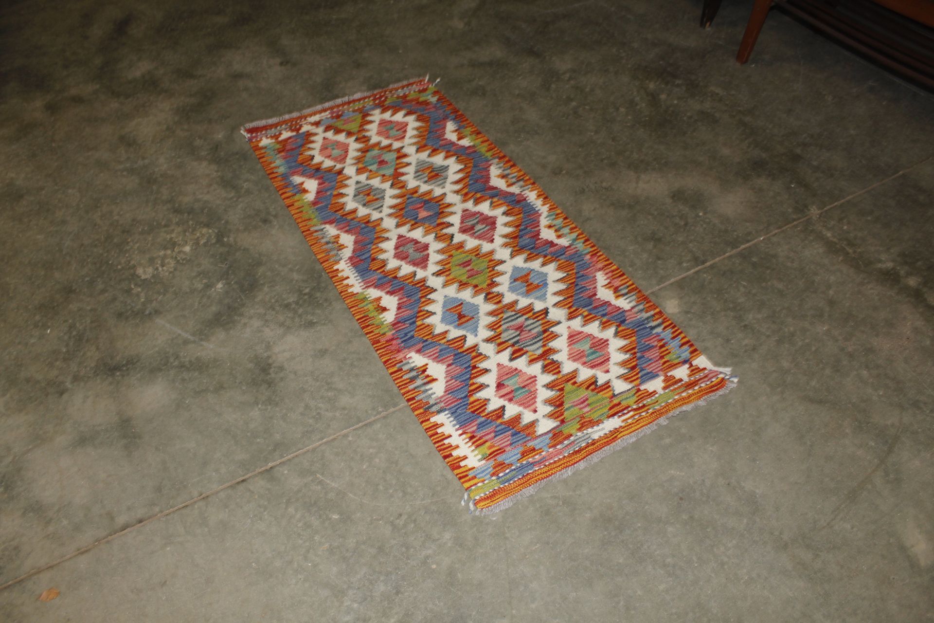 A Chobi Kilim runner approx. 5' x 2'2"