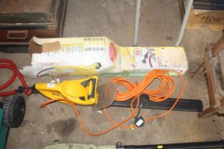 An Al-Ko electric hedge trimmer with original box