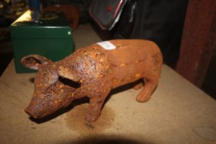 A cast iron figure of a pig (120)