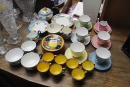 A collection of Italian pottery cups and saucers,