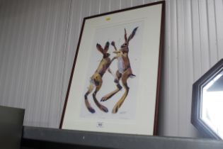 A limited edition print of two boxing hares entitl