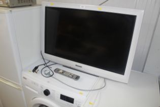 A Panasonic flat screen TV with remote control