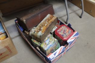 A box of advertising tins