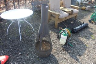 A large metal chimenea