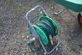 A Hozelock hose reel and length of hose